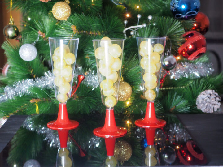 Three glasses with 12 grapes